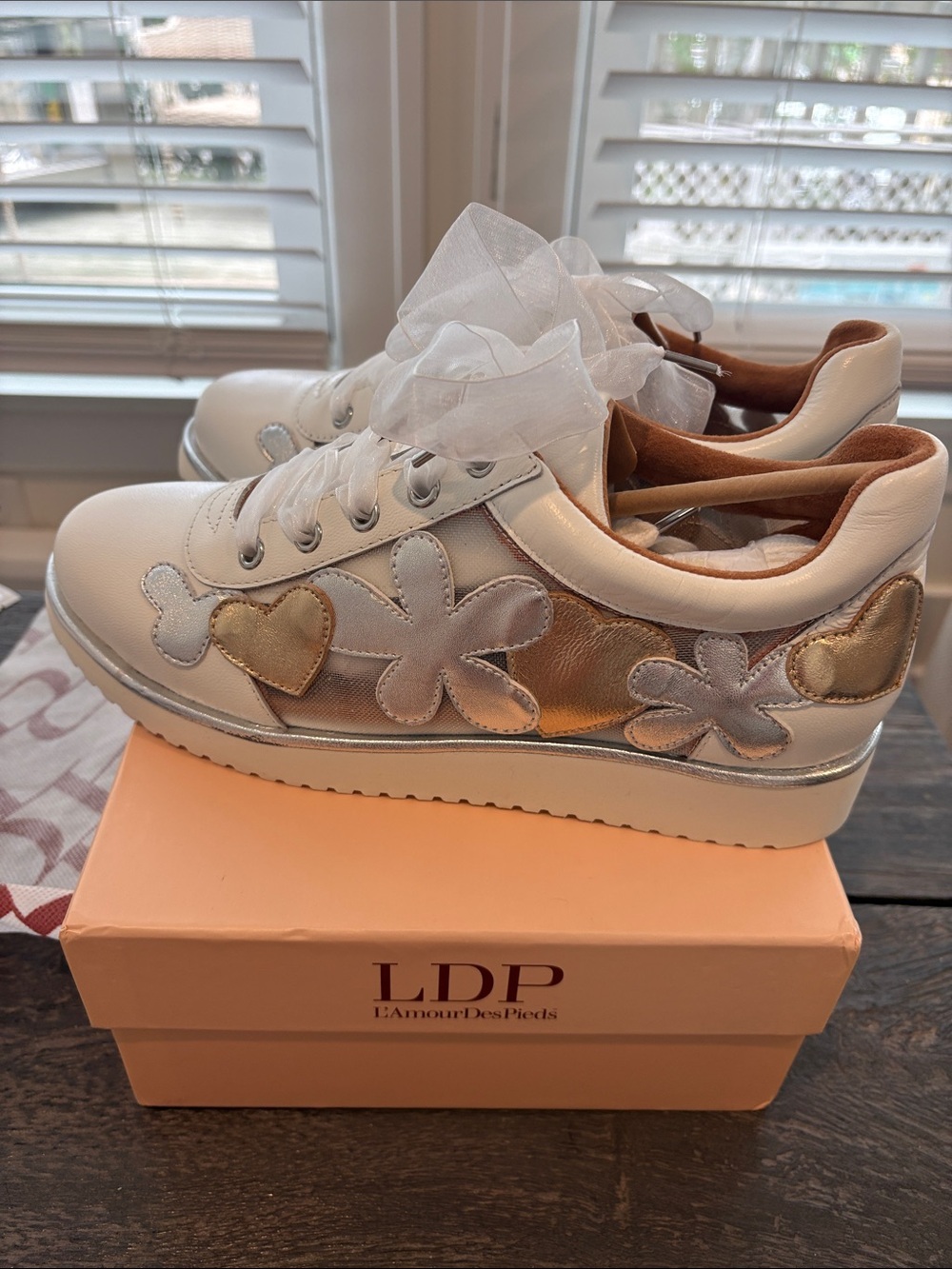 L'Amour Des Pieds White Leather Sneakers with Gold Floral and Heart Accents